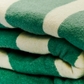 Manta calentita verde olive para salón